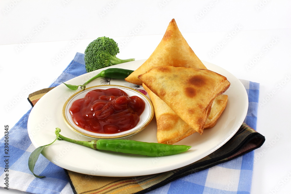 traditional indian gujarati food vegetable samosa with tomato sauce traditional indian gujarati food vegetable samosa with tomato sauce