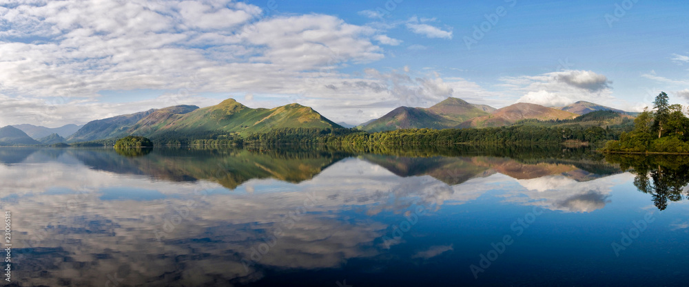 Derwent Reflections with view of the Cumbrian mountains in the Lake District, Cumbria, England Derwent Reflections with view of the Cumbrian mountains in the Lake District, Cumbria, England