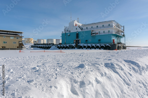 Work Vessel Frozen into the Mackenzie River at Inuvik photo