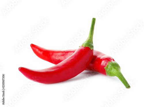 Foto Red hot chili peppers on white background