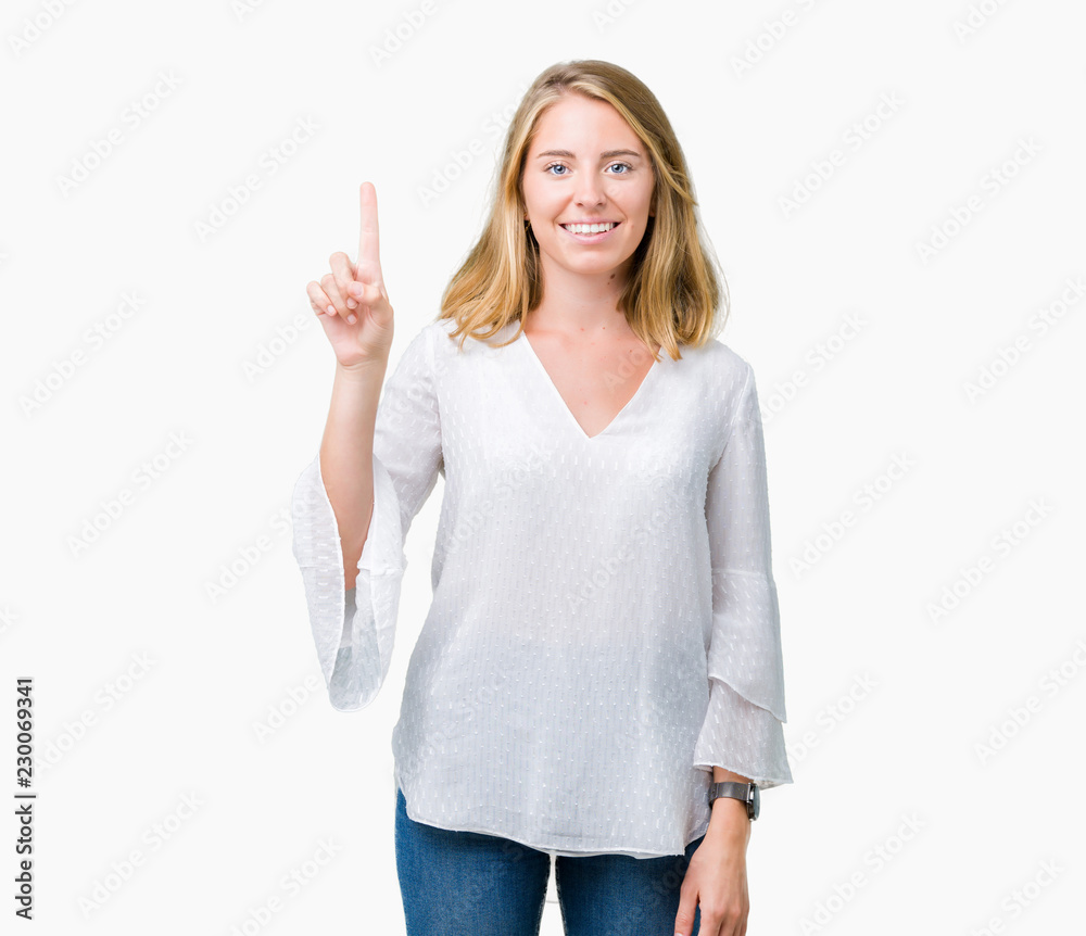 Beautiful young elegant woman over isolated background showing and pointing up with finger number one while smiling confident and happy. Beautiful young elegant woman over isolated background showing and pointing up with finger number one while smiling confident and happy.