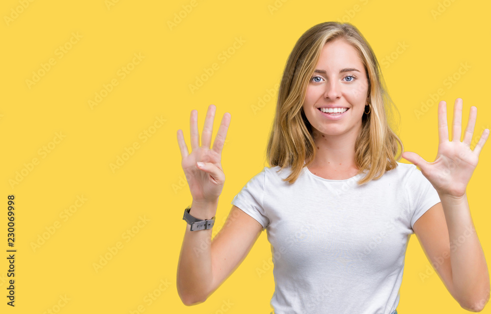 Beautiful young woman wearing casual white t-shirt over isolated background showing and pointing up with fingers number nine while smiling confident and happy. Beautiful young woman wearing casual white t-shirt over isolated background showing and pointing up with fingers number nine while smiling confident and happy.