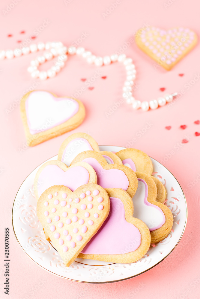 Valentine's day cookies close up on pink background. Valentine's day cookies close up on pink background.
