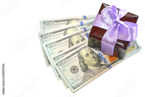 Jewelry box and dollar banknotes on a white background.