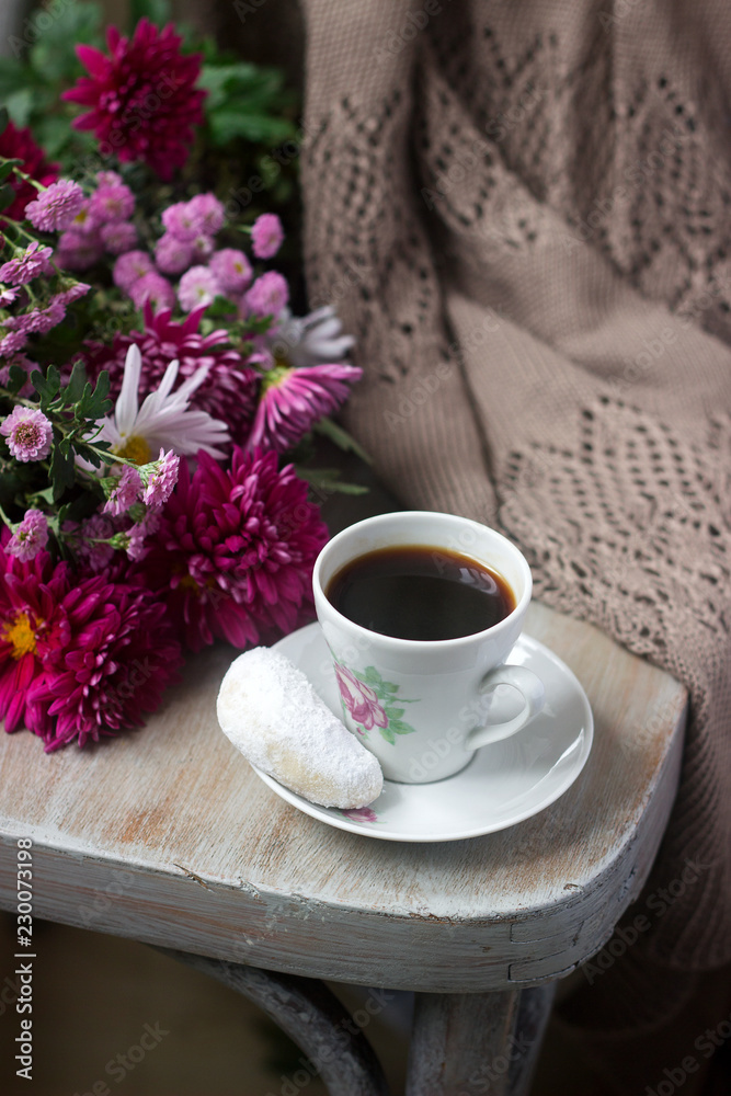 Autumn still life with coffee, homemade biscuits vanilla crescents, chrysanthemums and plaid. Autumn still life with coffee, homemade biscuits vanilla crescents, chrysanthemums and plaid.