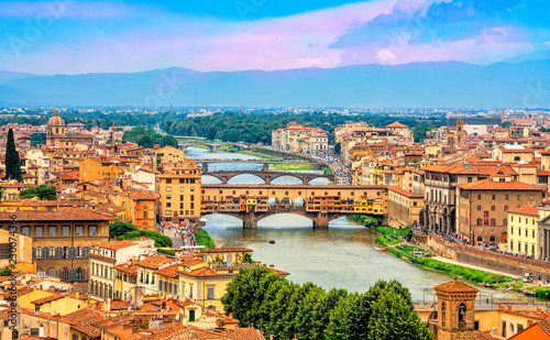 Obraz na płótnie Panoramic view of medieval stone bridge Ponte Vecchio over Arno river in Florence (Firenze), Tuscany, Italy, Europe