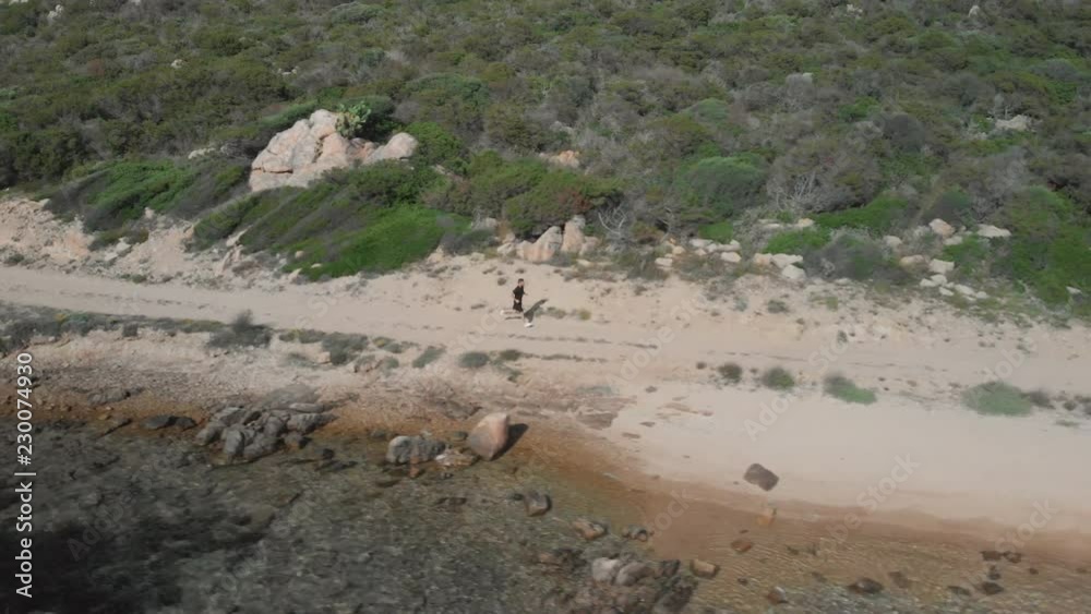Aerial View of Athletic Man Running on the Beach 2 Aerial View of Athletic Man Running on the Beach 2