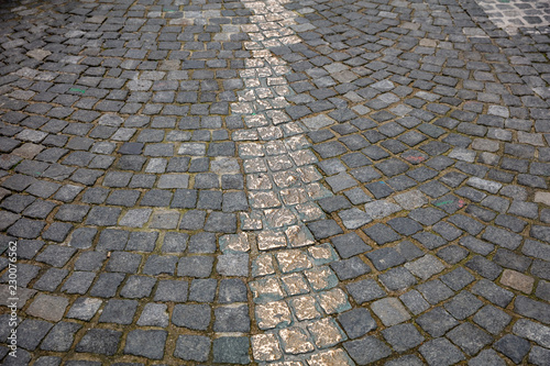 Memorial in Munich city center. Gold pathway marked out on the cobblestone