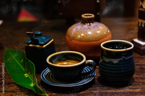 Tea and coffee In a ceramic cup on table wood  