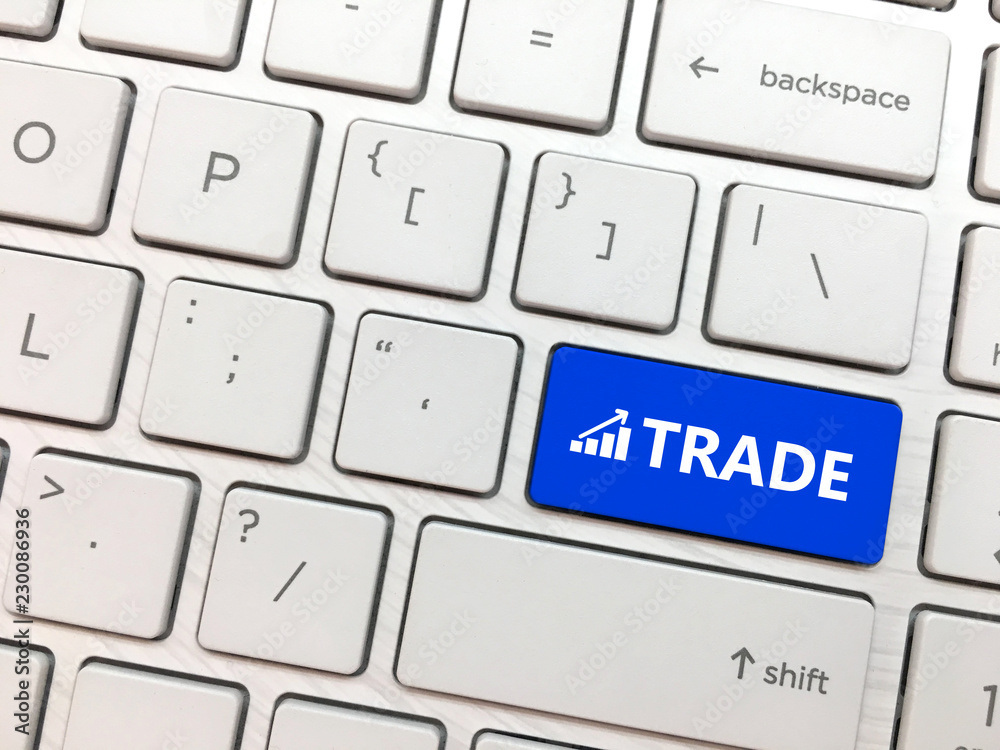 Computer keyboard enter button with TRADE and symbol Computer keyboard enter button with TRADE and symbol