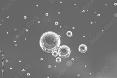 Water Black-and-white structure. Bubbles of oxygen under water. Macro