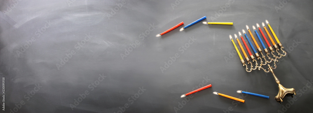 Banner of jewish holiday Hanukkah background with traditional menorah (traditional candelabra) and burning candles. Banner of jewish holiday Hanukkah background with traditional menorah (traditional candelabra) and burning candles.
