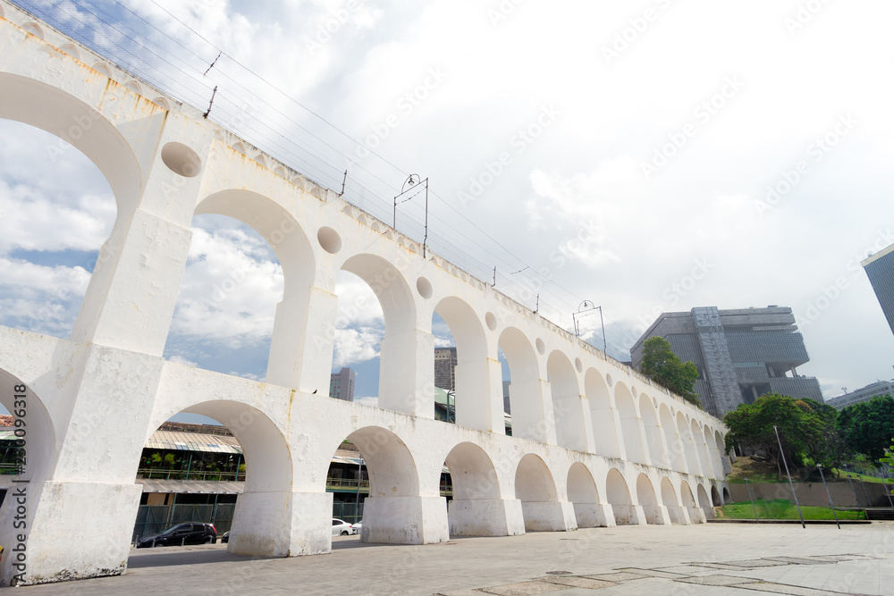 Arches of the Lapa neighborhood in Rio de Janeiro (Brazil) with office buildings in the background