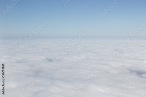 nature scenic landscape of soft focus fluffy clouds horizon foreshortening above heaven, copy space 