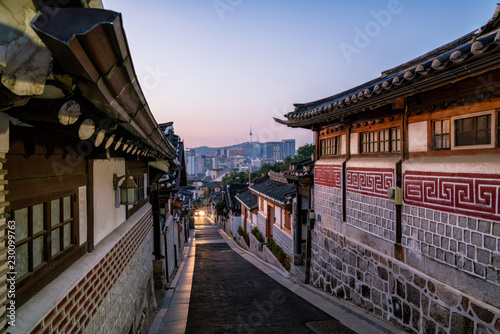 Sunrise scene of Bukchon Hanok Village at Seoul city, South Korea. Bukchon Hanok Village is home to hundreds of traditional houses.