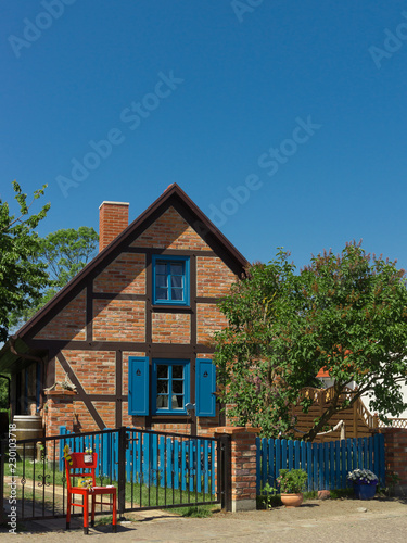 House with blue Windows