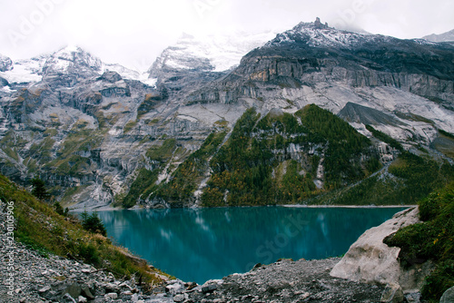Fototapeta Naklejka Na Ścianę i Meble -  View of Oeschinen Lake in the Swiss alps with beautiful turquoise water.