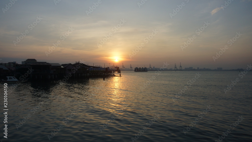 Beautiful silhouette during sunrise at Tan Jetty, George Town, Penang