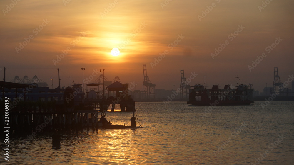 Beautiful silhouette during sunrise at Tan Jetty, George Town, Penang