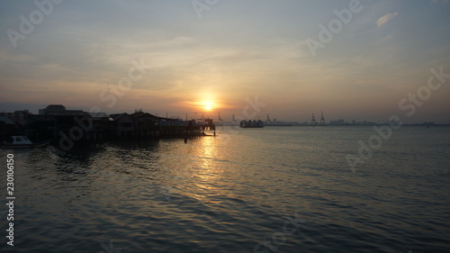 Beautiful silhouette during sunrise at Tan Jetty, George Town, Penang © craigansibin