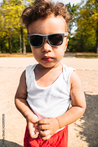Portrait of a cute little african-american or latin-american boy © pavelgulea