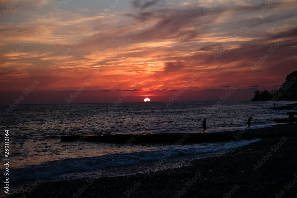 fabulous red, burgundy sky.  Sunset on the sea.