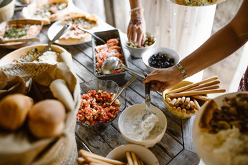 People eating fresh vegan food