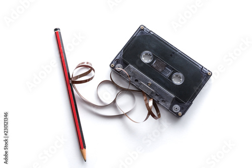 Chewed cassette and pencil for winding tape back in