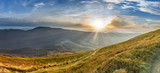 Sunset in the autumn in the mountains. Bieszczady National Park - Caryńska meadow - Poland.
