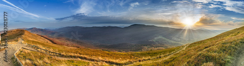 Sunset in the autumn in the mountains. Bieszczady National Park - Caryńska meadow - Poland. photo