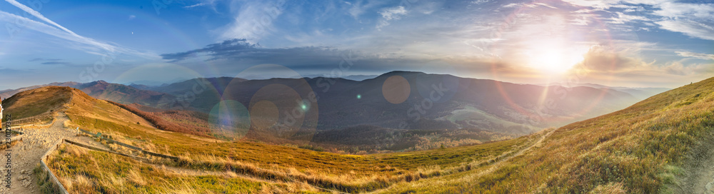 Fototapeta premium Sunset in the autumn in the mountains. Bieszczady National Park - Caryńska meadow - Poland.