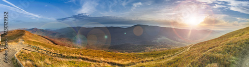 Sunset in the autumn in the mountains. Bieszczady National Park - Caryńska meadow - Poland. photo