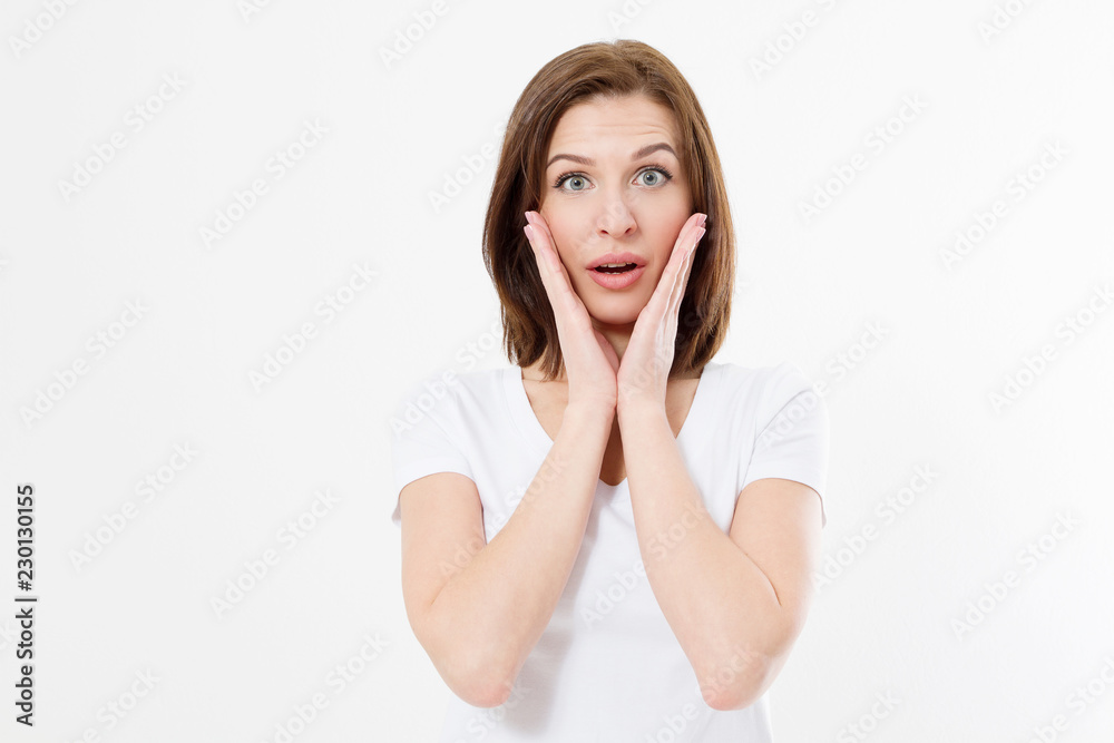 Surprised shocked excited woman face isolated on white background. Young caucasian girl in summer t shirt. Copy space Surprised shocked excited woman face isolated on white background. Young caucasian girl in summer t shirt. Copy space
