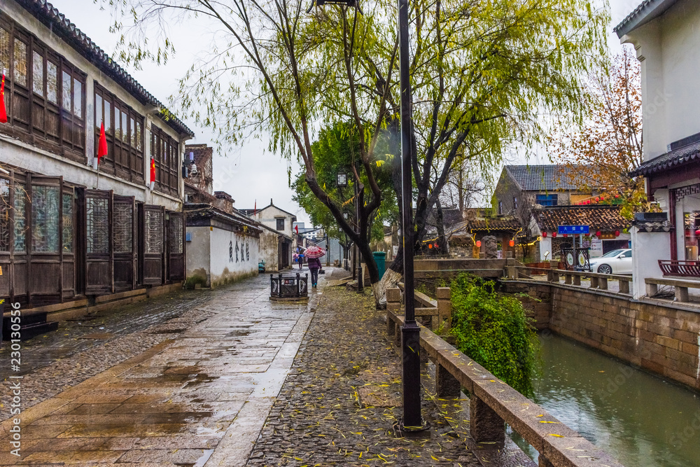 Beautiufl canal of Suzhou under the rain, China
