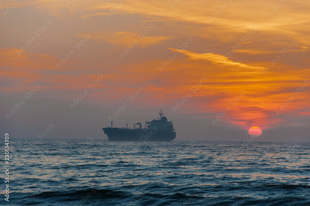  Cargo Ship At Beautiful sunset