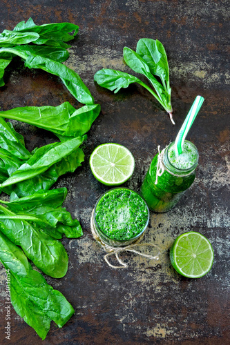 Bright green spinach smoothies. Healthy green detox drink. Spinach Smoothie with Lime.