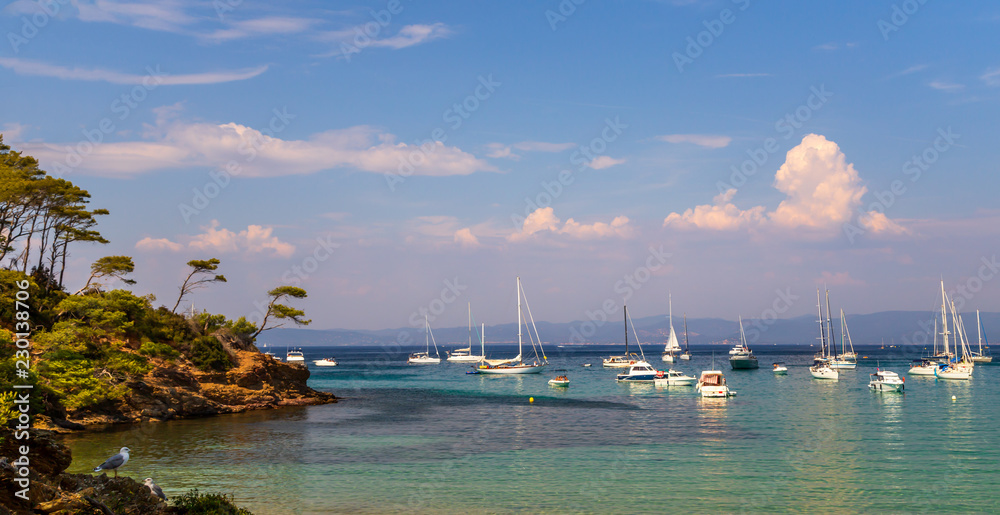 Beautiful bay with yachts in Porquerolles, the island in southern France. Holidays in France.