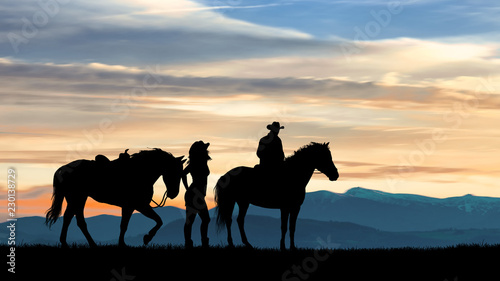 Fototapeta Naklejka Na Ścianę i Meble -  couple on horseback at sunset