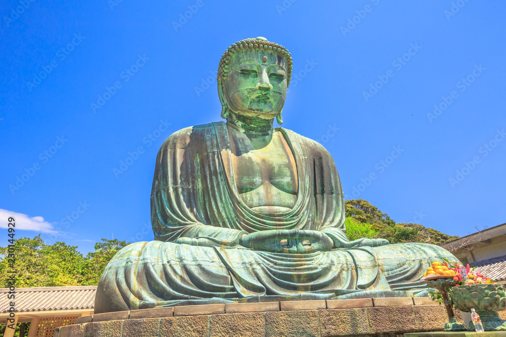 Kotoku-in Temple in Kamakura, Kanto region, Japan. The temple is famous for Great Buddha or Daibutsu, a monumental bronze statue of Amida Buddha. Popular landmark and icon of Japan. Kotoku-in Temple in Kamakura, Kanto region, Japan. The temple is famous for Great Buddha or Daibutsu, a monumental bronze statue of Amida Buddha. Popular landmark and icon of Japan.