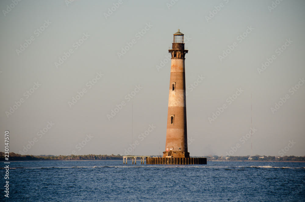 Morris Island Lighthouse at sunset in Folly Beach South Carolina Morris Island Lighthouse at sunset in Folly Beach South Carolina