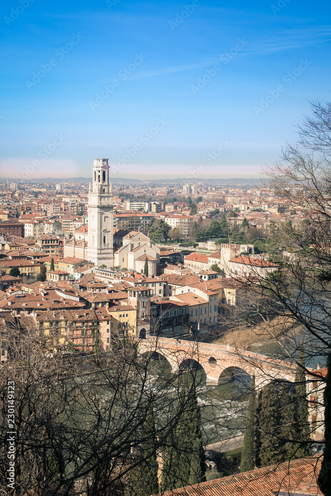 Verona Cathedral and stone bridge aerial view.