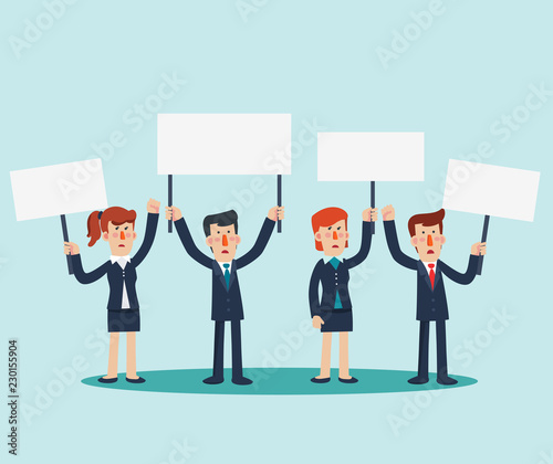 Group of young business people protesting in a city street. Business men and women holding white protest posters