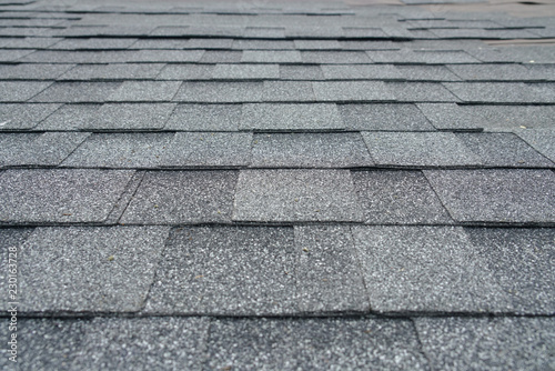 close up on new installed roof shingle 