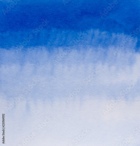 Blue watercolor background on paper