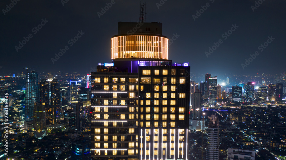 Beautiful skyscraper with glowing light at night