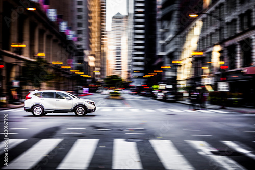 Wallpaper Mural Car speeding down a road in downtown Chicago Torontodigital.ca