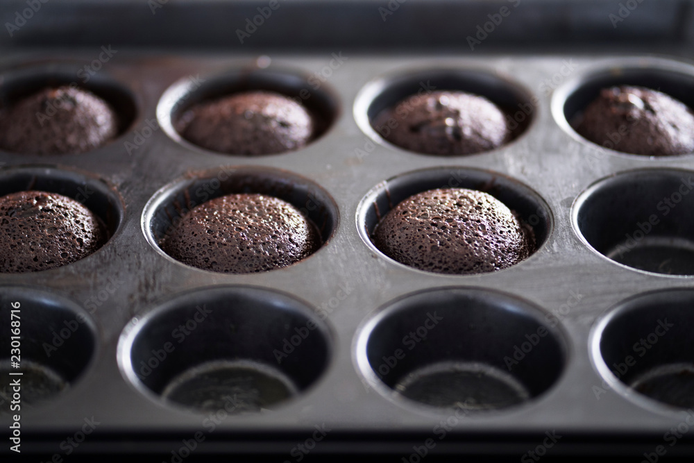 Homemade baked chocolate cookies on the mold Homemade baked chocolate cookies on the mold