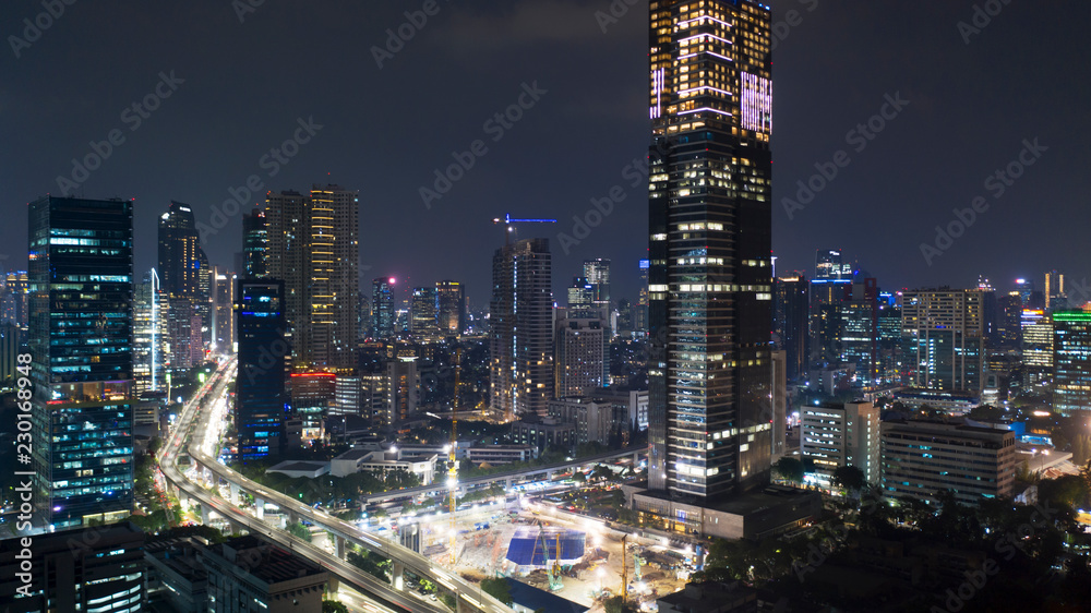 Jakarta cityscape with modern skyscrapers at night