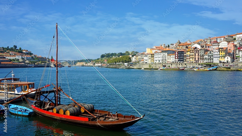 douro river in porto with colorful traditional boats