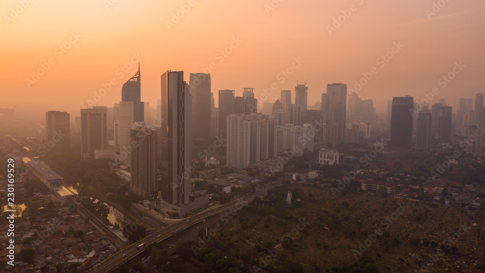 Misty morning with skyscrapers in Jakarta